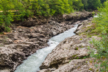 Summer landscape with mountain river. Belaya River in Republic of Adygea, Russia