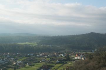 Fototapeta na wymiar Village between mountains