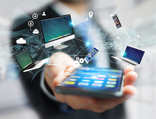 Computer and devices displayed on a futuristic interface with interantional network - Multimedia and technology concept