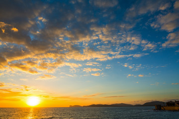 Obraz premium Dramatic sky over Alghero at sunset