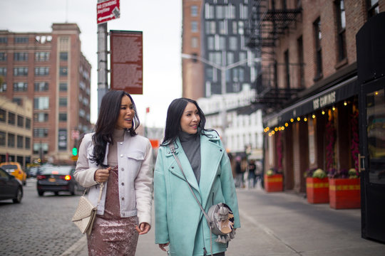 Two girlfriends walking on the streets of meat packing District