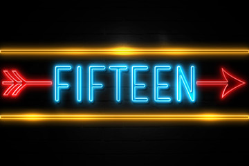 Obraz premium Fifteen - fluorescent Neon Sign on brickwall Front view