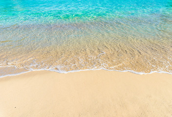 Fototapeta na wymiar Summer Holiday background, beautiful sand beach with turquoise tropical sea water