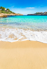 Beautiful beach with turquoise sea water at the bay coast of Majorca Cala Marcal, Spain