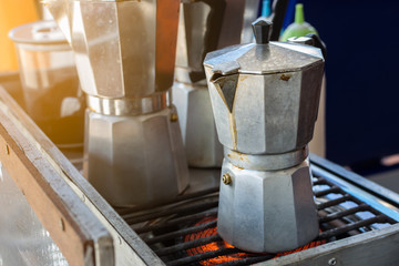 Moka pot coffee maker on stove
