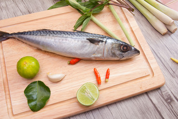 Prepare fish on  cutting board