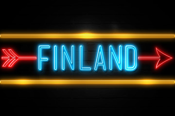 Finland  - fluorescent Neon Sign on brickwall Front view