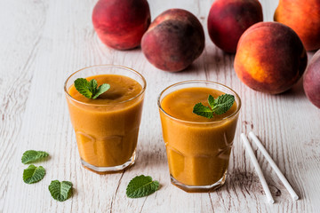 Healthy beverage - fresh blended peach smoothie with mint