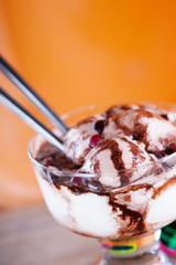 Ice cream sundae and spoons 