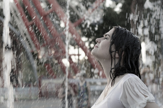 the girl's profile in fountain splashes