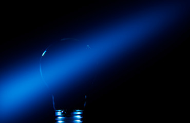 Blue light passing through the Edison bulb