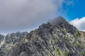 Fototapeta na wymiar Tatra mountains landscape, Poland,Kozi Wierch peak under clouds