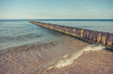 Fototapeta na wymiar Wooden groyne - Baltic seascape, Poland