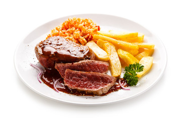    Grilled steak with french fries on white background 