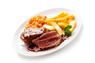     Grilled steak with french fries on white background 