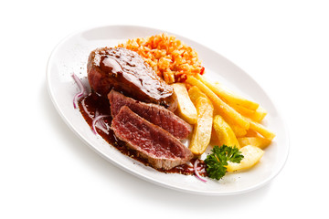     Grilled steak with french fries on white background 