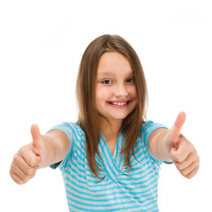 Girl showing OK sign isolated on white background