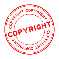 Grunge red copyright round rubber seal stamp on white background
