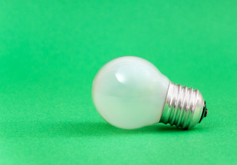 Small bulb on a green background.