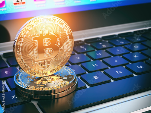 Golden Bitcoins On Laptop Keyboard Mining Of Cryptocurrency - 