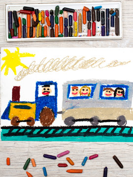 Photo of colorful drawing: train with smiling passengers
