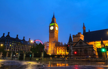 The Big Ben tower at rainy night, London, United Kingdom.