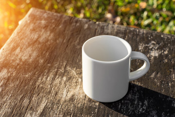White coffee mug in the morning time