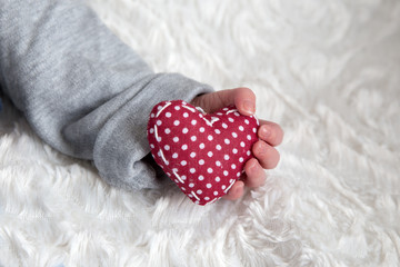 Baby Hand mit Herz
