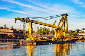 Fototapeta na wymiar Huge floating crane at work in port of Gdansk, Poland.