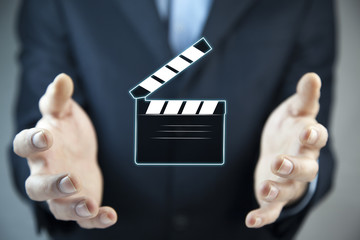 man hand movie clapper slapstick