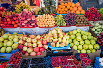 Fruit market with various colorful fresh fruits. Fresh fruits.  Fruits  at a farmers market