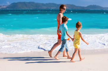 Mother and kids at tropical beach