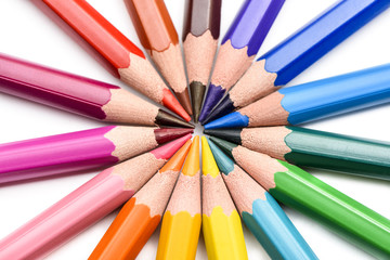 Naklejka premium Colored pencils on white background
