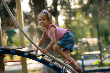 Fototapeta premium Girl child in the playground