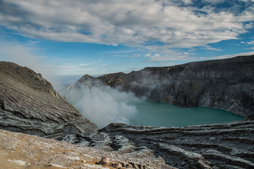 Lake and Sulfur Mine at Khawa Ijen Volcano Crater, Indonesia