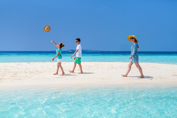 Mother and kids at tropical beach © TravelPhotoBloggers