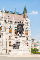 Fototapeta na wymiar Equestrian statue of Count Gyula Andrassy near the building of Hungarian Parliament, Budapest, Hungary.