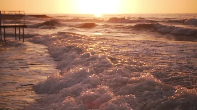 magnificent surf at sunrise time in slow motion, nature in warm colours