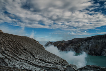 Lake and Sulfur Mine at Khawa Ijen Volcano Crater, Indonesia