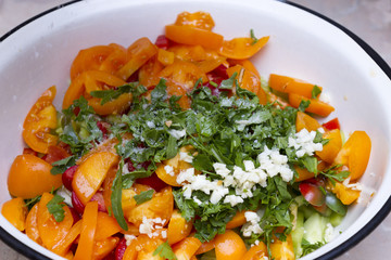 plate of green salad with vegetables, top view, horizontal