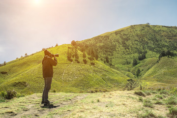 Young man asian photographers with  shoot photo.
