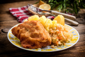 Fried cod fillet served.