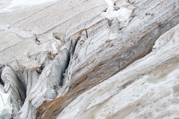 mountaineering in marmolada glacier in dolomites