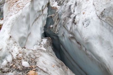 mountaineering in marmolada glacier in dolomites