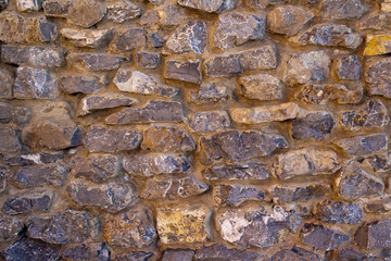 Large masonry. Background The wall of an old fortress