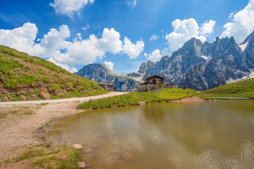 Naklejka na ściany i meble Baita Segantini and the Pale di San Martino are the largest group of Dolomites, with about 240 km² of extension, located between the eastern Trentino and the province of Belluno, Italy.