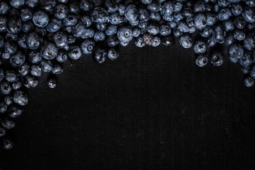 blueberry berries on a black background