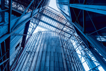 Obraz premium Modern silos for storing grain harvest. Agriculture.