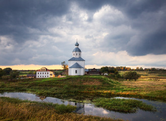 Russian field. Church and river. Suzdal. Russia.