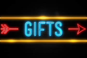 Gifts  - fluorescent Neon Sign on brickwall Front view